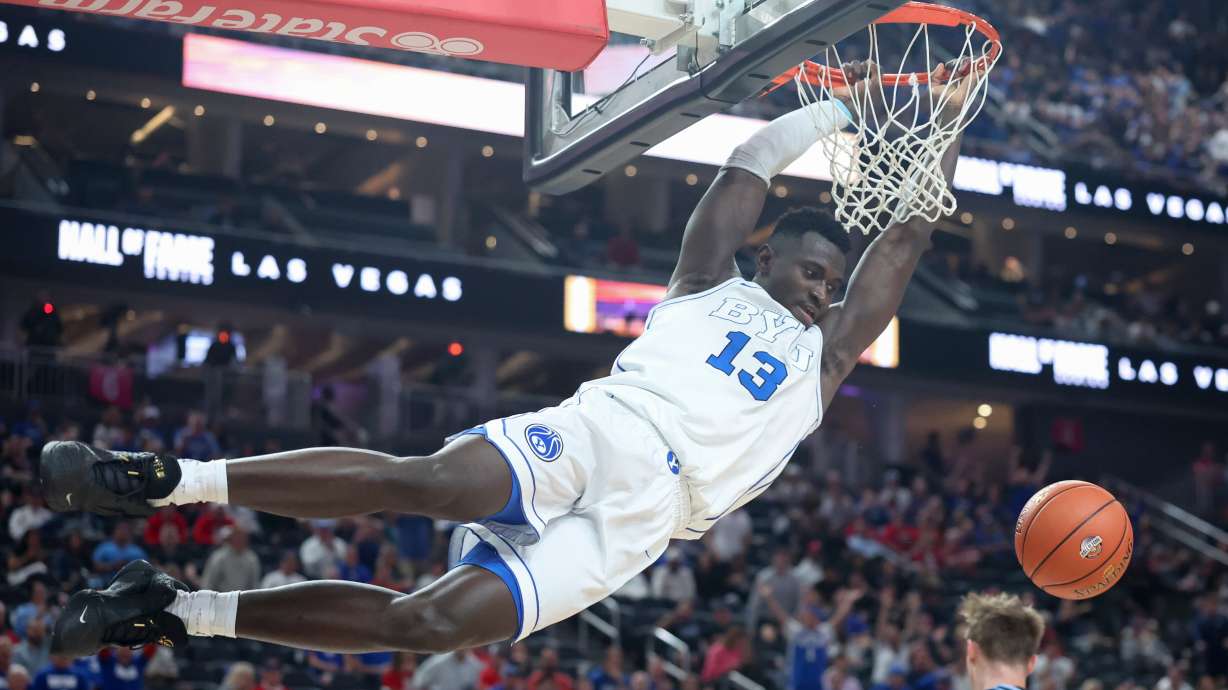 BYU forward Keba Keita (13) dunks during the first half of an NCAA college basketball game against Villanova , Monday, Nov. 3, 2025, in Las Vegas