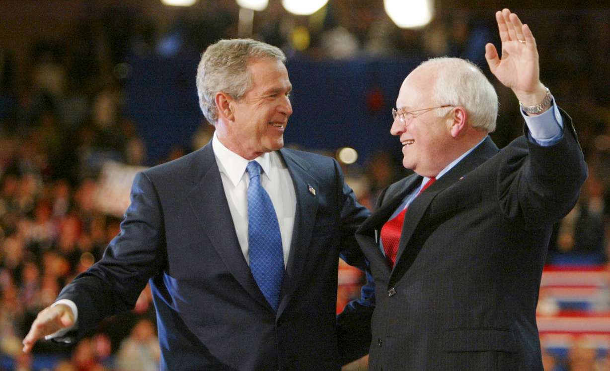 President George W. Bush and Vice President Dick Cheney embrace following President Bush's acceptance speech in Madison Square Garden during the final night of the Republican National Convention Sept. 2, 2004, in New York. Cheney died Monday at age 84.