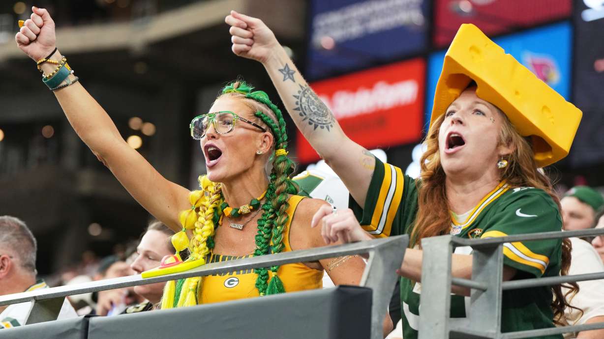 FILE - Green Bay Packers fans cheer during the first half of an NFL football game against the Arizona Cardinals Sunday, Oct. 19, 2025, in Glendale, Ariz.