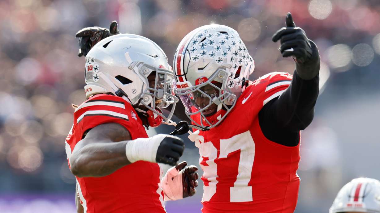 Ohio State linebacker Arvell Reese, left, celebrates his sack against Penn State with teammate defensive lineman Kenyatta Jackson during the second half of an NCAA college football game, Saturday, Nov. 1, 2025, in Columbus, Ohio.