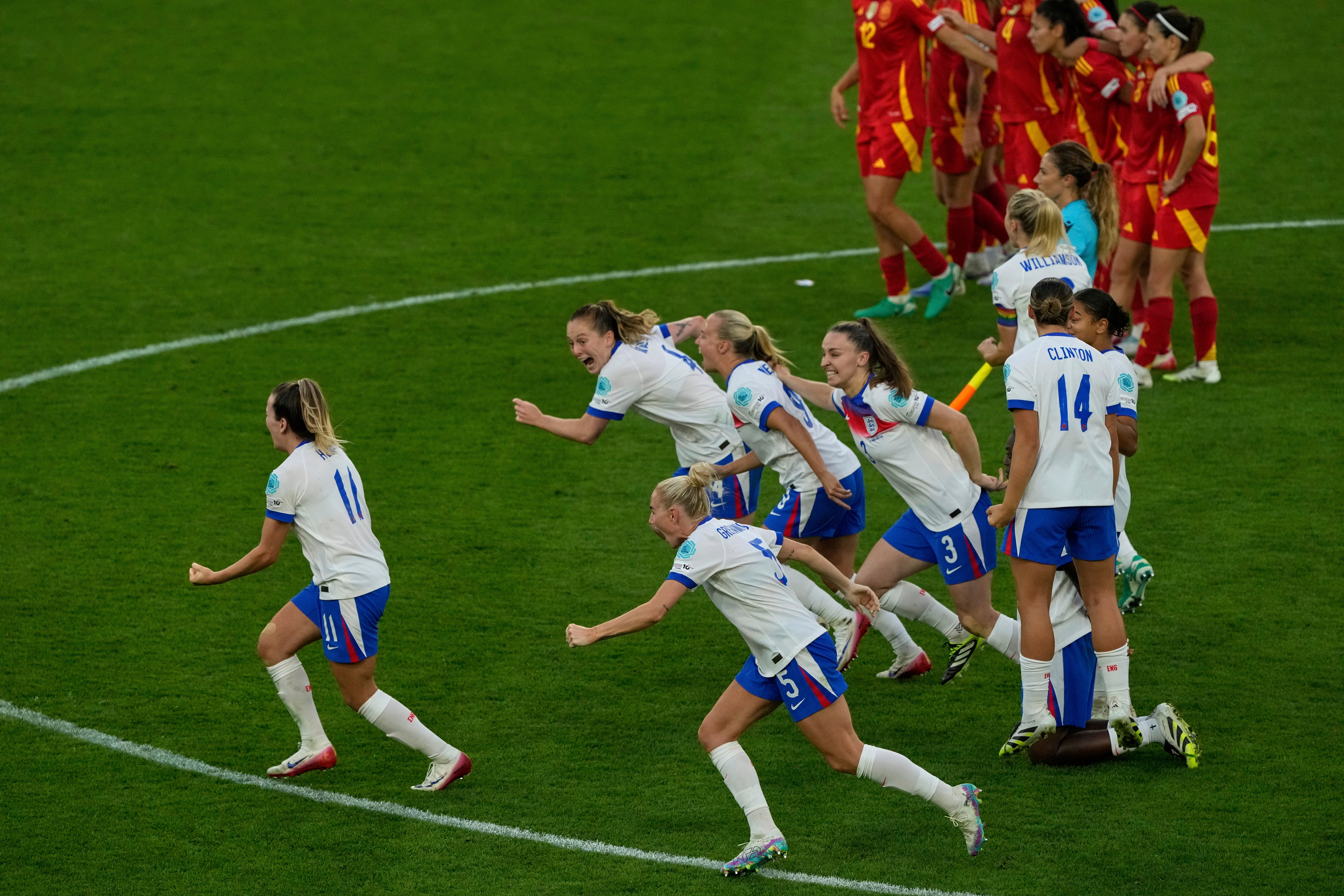 FILE - England players celebrate after winning the Women's Euro 2025 final soccer match between England and Spain at St. Jakob-Park in Basel, Switzerland, Sunday, July 27, 2025.