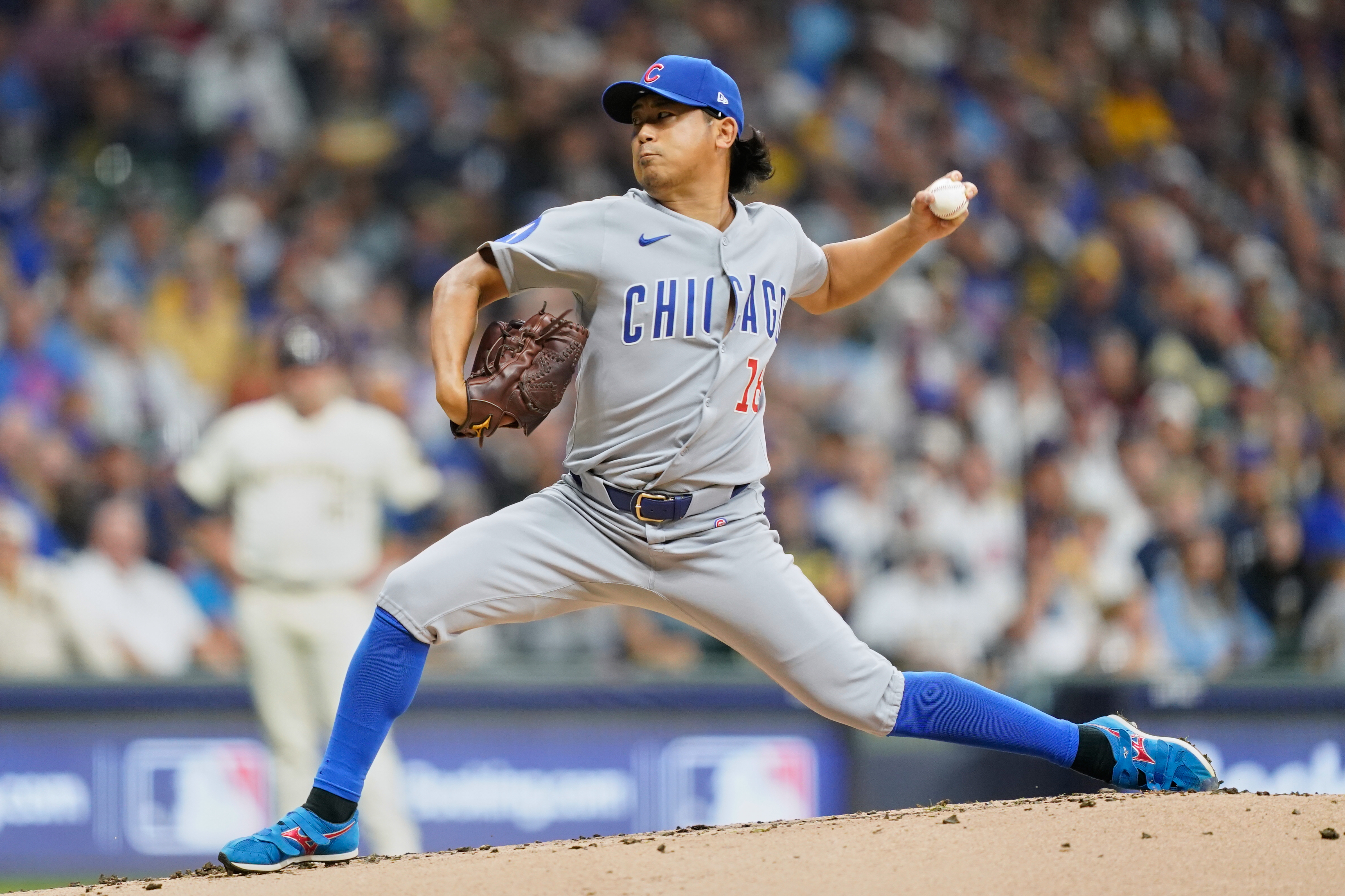 Chicago Cubs starting pitcher Shota Imanaga (18) delivers during the first inning of Game 2 of baseball's National League Division Series against the Milwaukee Brewers Monday, Oct. 6, 2025, in Milwaukee.