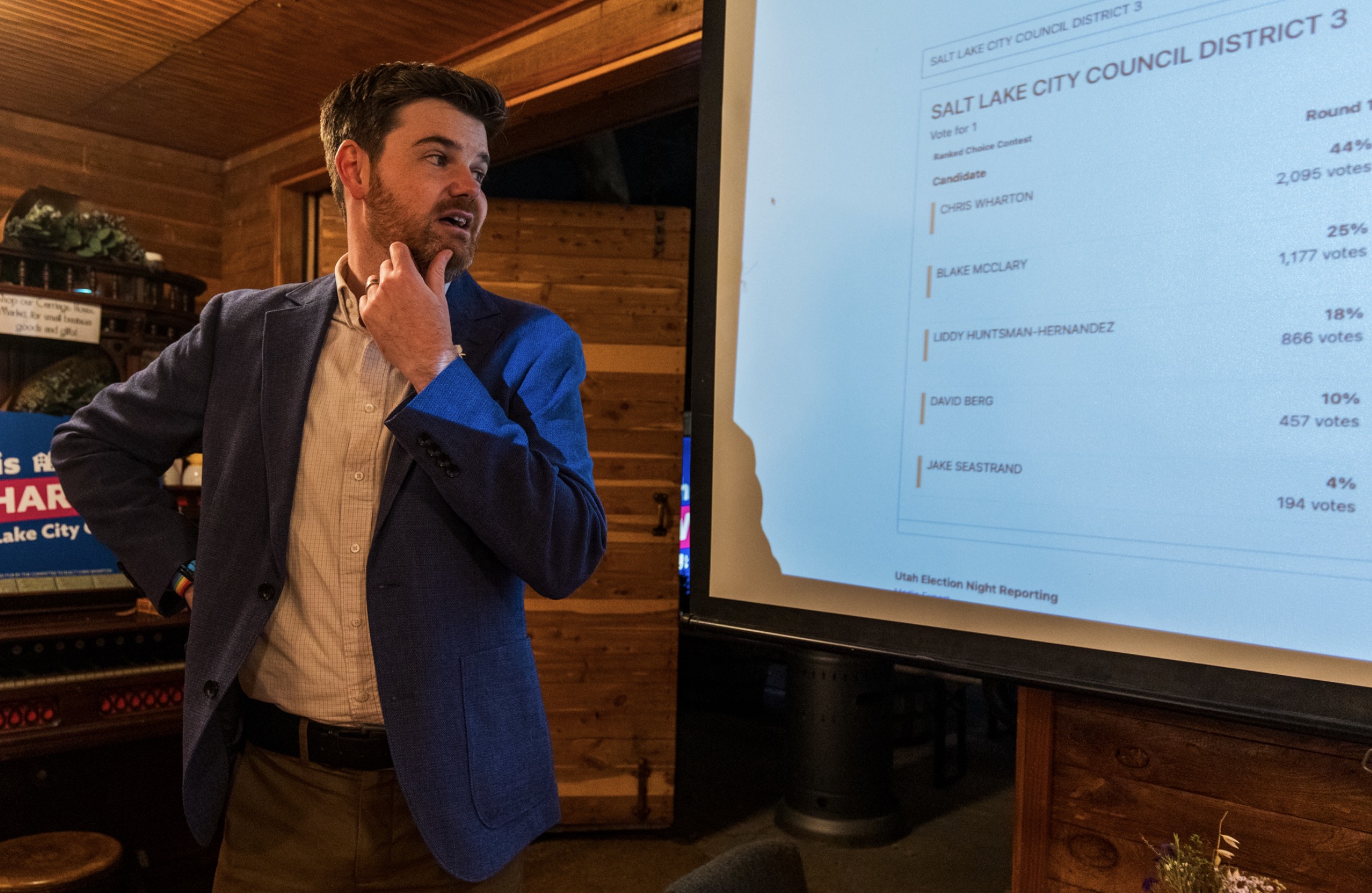 Salt Lake City Councilman Chris Wharton stares at election results on a screen at Publik Coffee Roasters Tuesday night. His campaign declared victory in the city's crowded District 3 race.