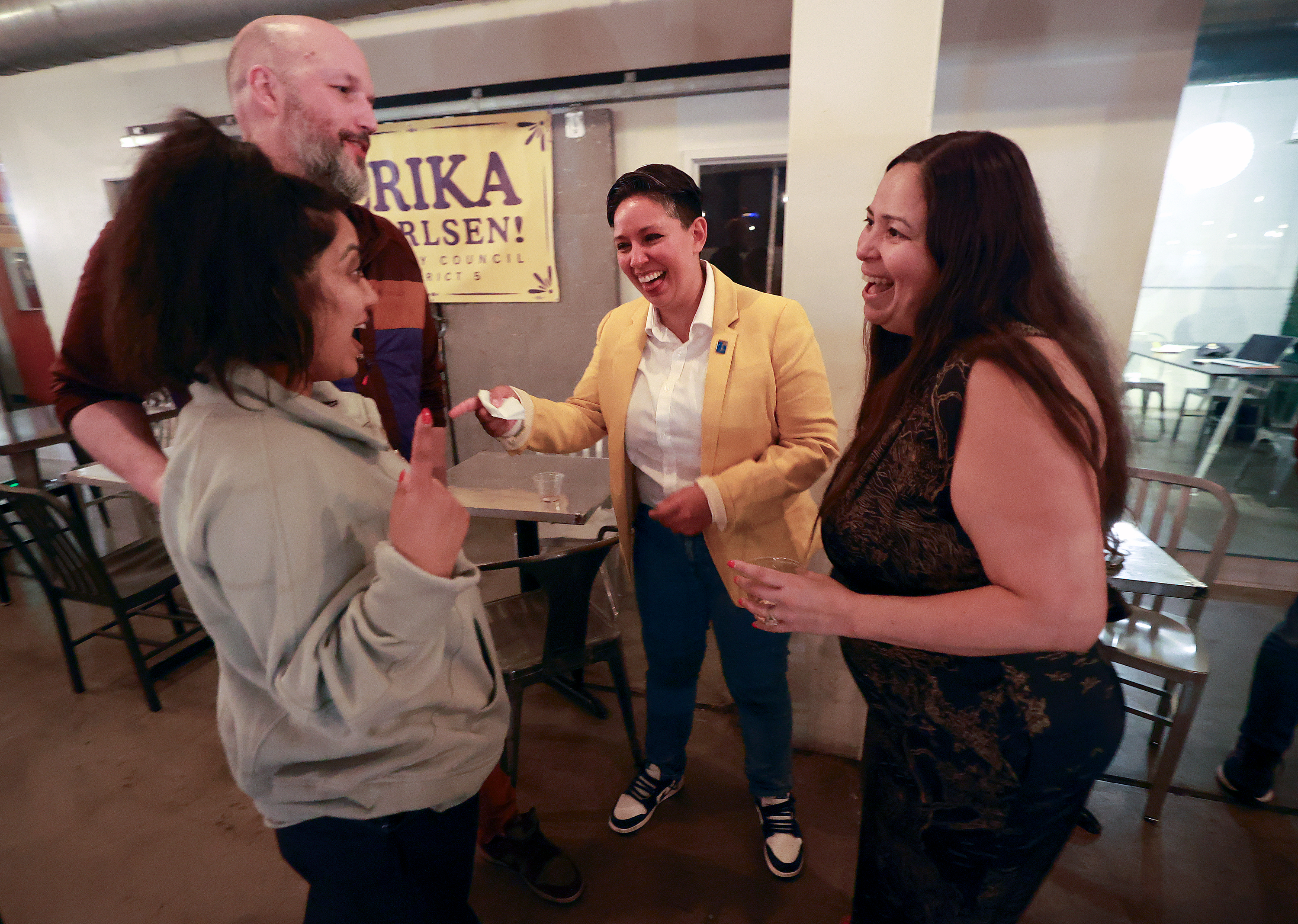 Ripple Desai, Carmine Genovese, Erika Carlsen and Rosa Aldana talk after Carlsen won the election for the Salt Lake City Council District 5 seat on election night at Publik in Salt Lake City on Tuesday.