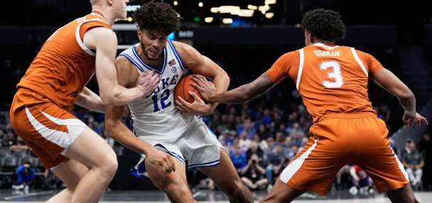 Jon Scheyer challenged top recruit Cameron Boozer at half. The Duke freshman responded in a big way