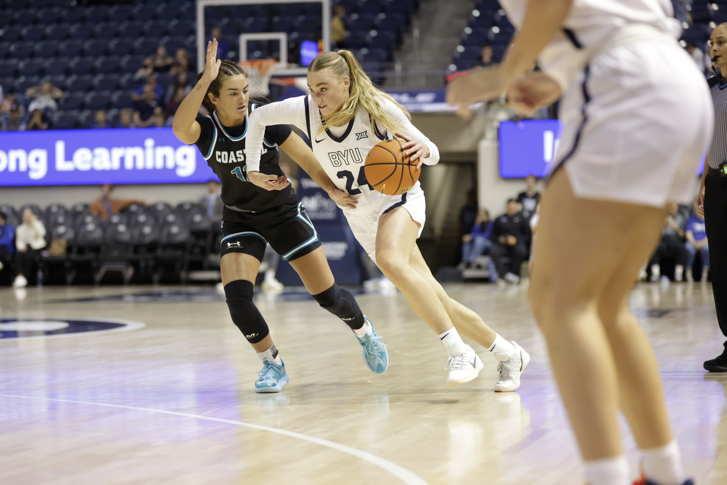 BYU's Brinley Cannon drives against Coastal Carolina, Wednesday, Nov. 5, 2025 in the women's basketball season opener at the Marriott Center in Provo, Utah.