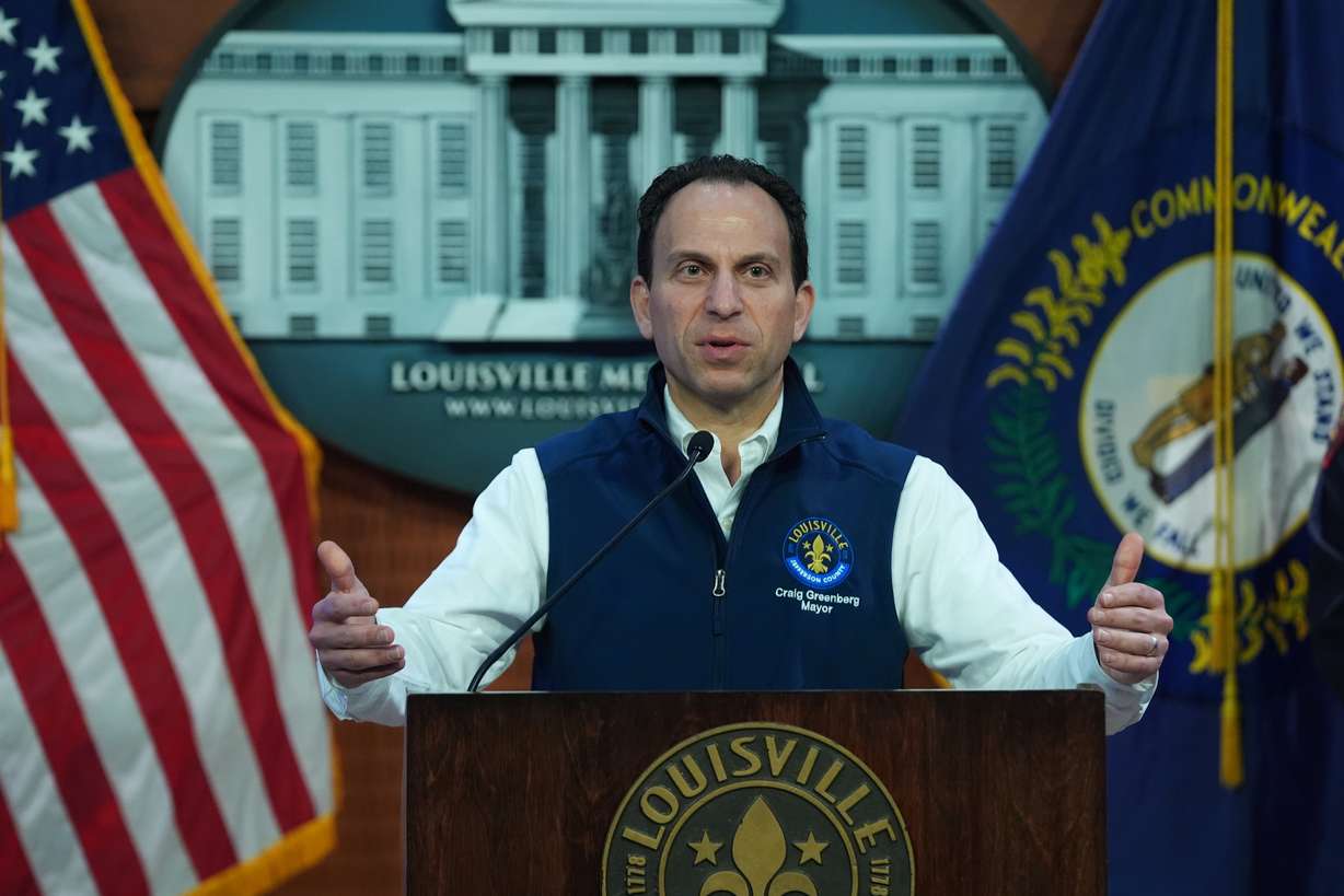 Louisville Mayor Craig Greenberg speaks about the crash of UPS Flight 2976 at Louisville Muhammad Ali International Airport, Thursday, in Louisville, Ky. Greenberg called the crash site "horrific."