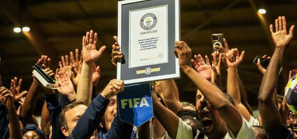 FIFA co-workers break Guinness World Record for most multinational soccer game