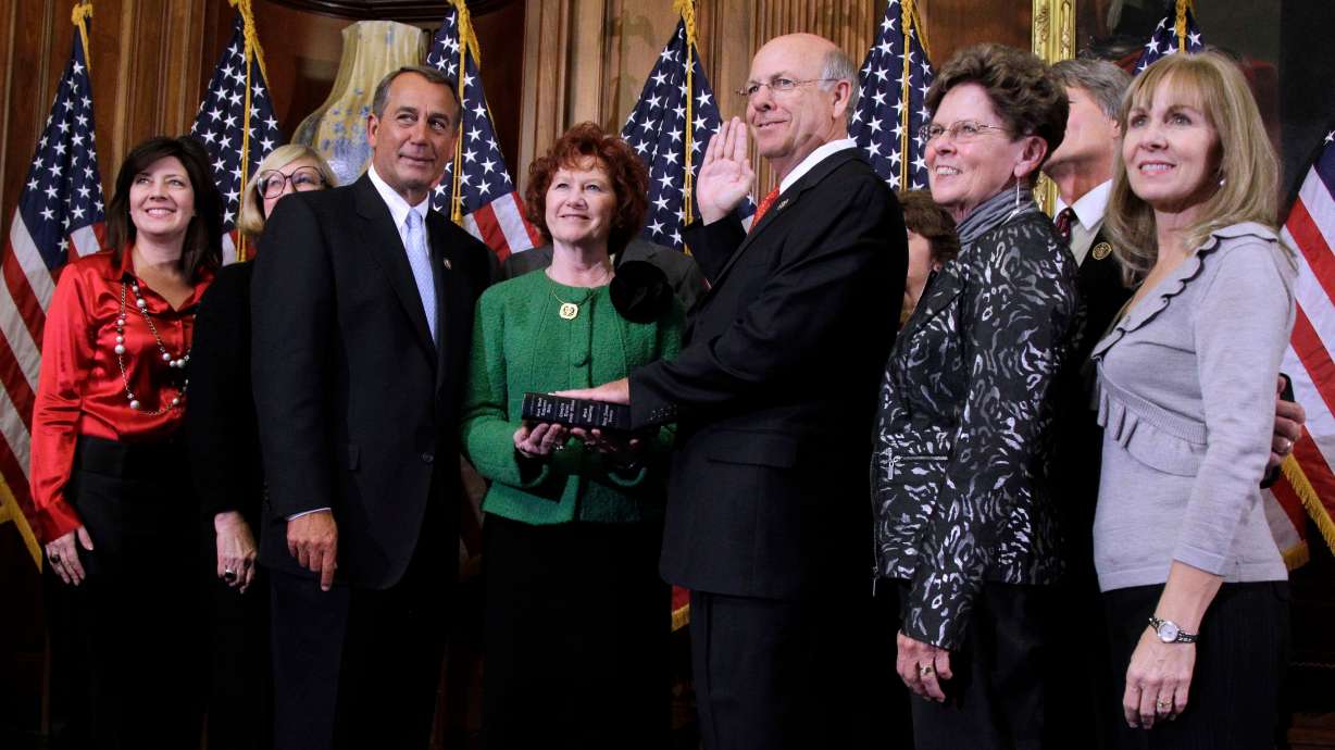 House Speaker John Boehner of Ohio participates in a ceremonial House swearing-in ceremony for Rep. Steven Pearce, R-N.M., accompanied by his family, on Capitol Hill in Washington, Jan. 5, 2011. Pearce was nominated to lead the Bureau of Land Management on Thursday.