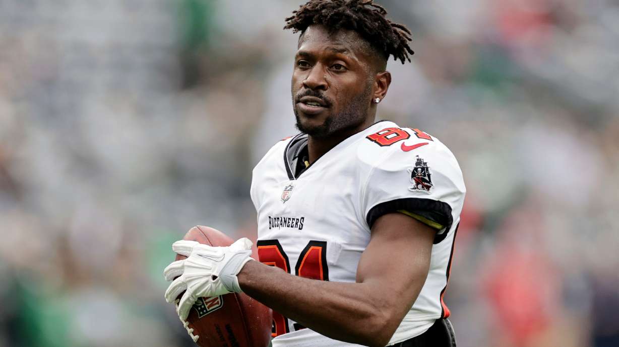 FILE - Tampa Bay Buccaneers wide receiver Antonio Brown (81) walks on the field during an NFL football game against the New York Jets, Jan. 2, 2022, in East Rutherford, N.J.