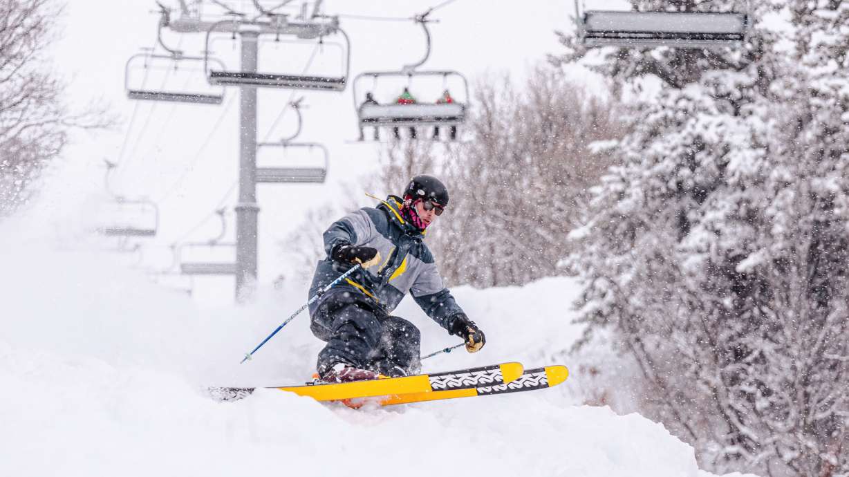 A skier cruises down a run at Nordic Valley Ski Resort in Eden, Weber County. An Ogden-based company is attempting to make skiing and snowboarding more affordable for families.