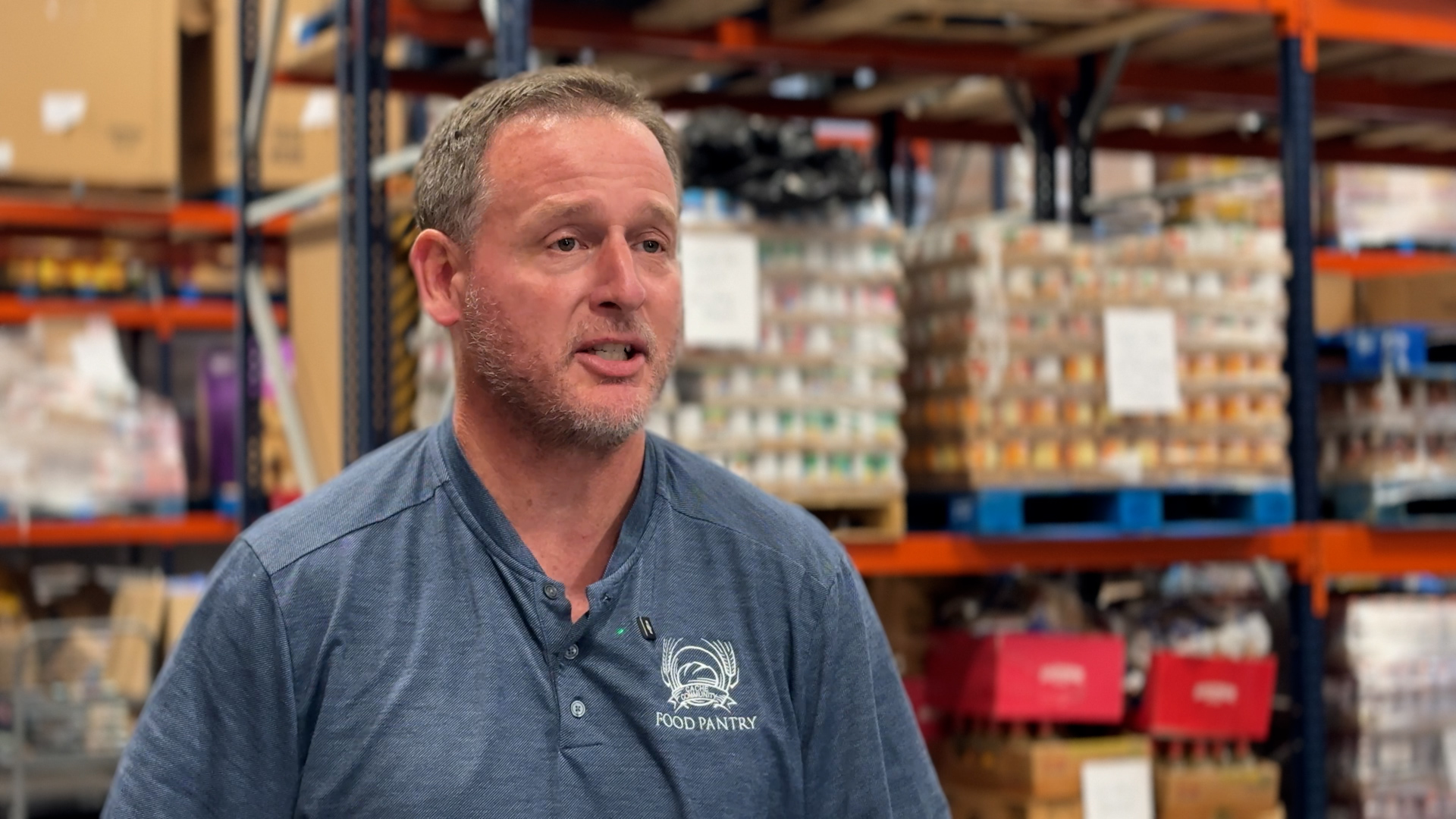 Matt Whitaker, director of Cache Community Food Pantry, speaks with KSL-TV, Thursday. Whitaker said the food pantry is seeing many new applications for help daily.