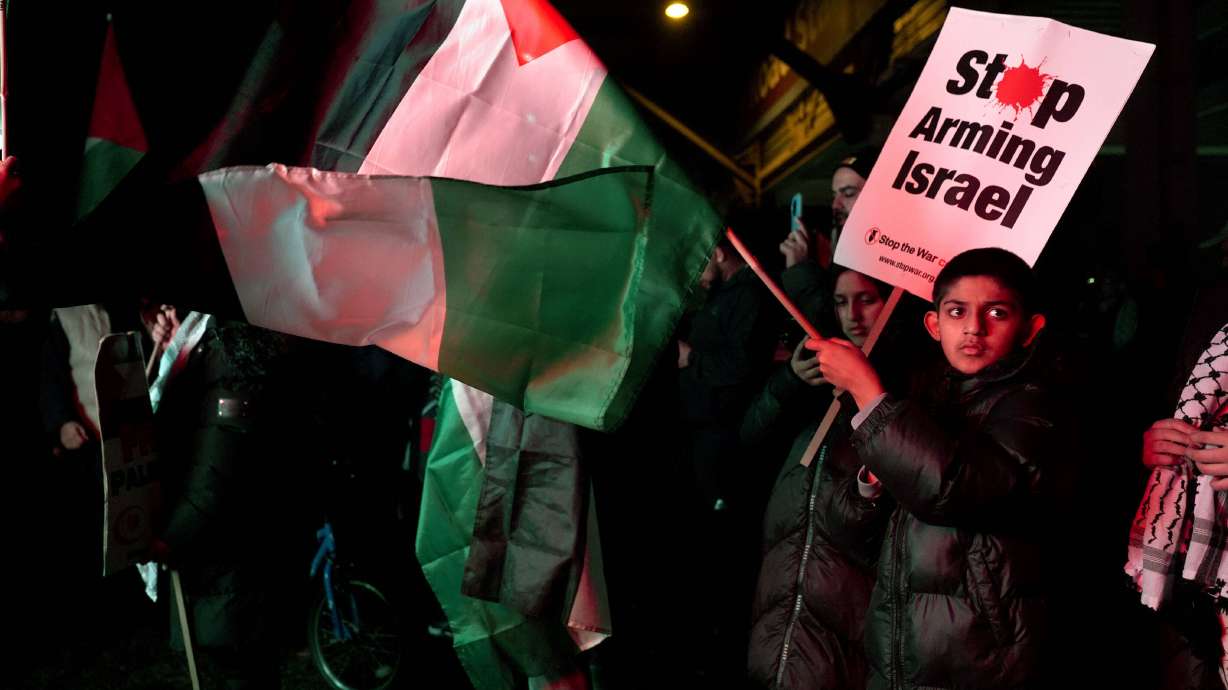 Pro Palestinian campaigners protest outside Villa Park, ahead of the Europa League soccer match between Aston Villa and Maccabi Tel Aviv in Birmingham, England, Thursday, Nov. 6, 2025.