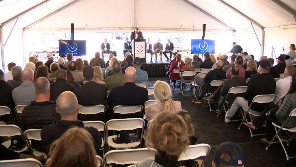 A crowd listens Thursday to the groundbreaking of a new artificial intelligence data center in Millard County.