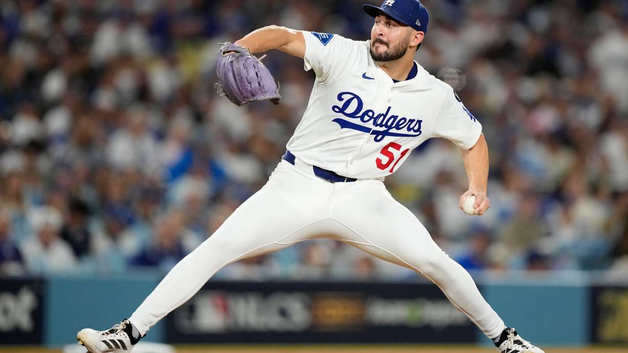 Los Angeles Dodgers pitcher Alex Vesia throws against the Milwaukee Brewers during the seventh inning in Game 4 of baseball's National League Championship Series, Friday, Oct. 17, 2025, in Los Angeles.