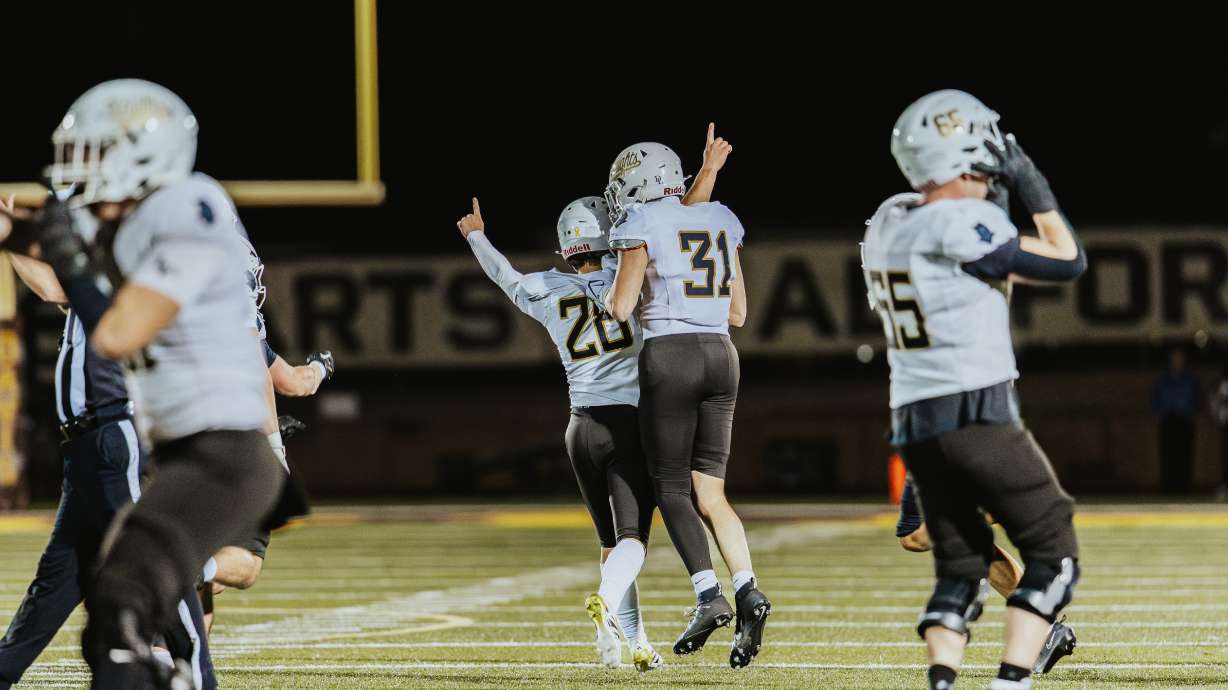 Lone Peak and Davis battle in the quarterfinals of the 6A state playoffs in Kaysville on Nov. 7, 2025.