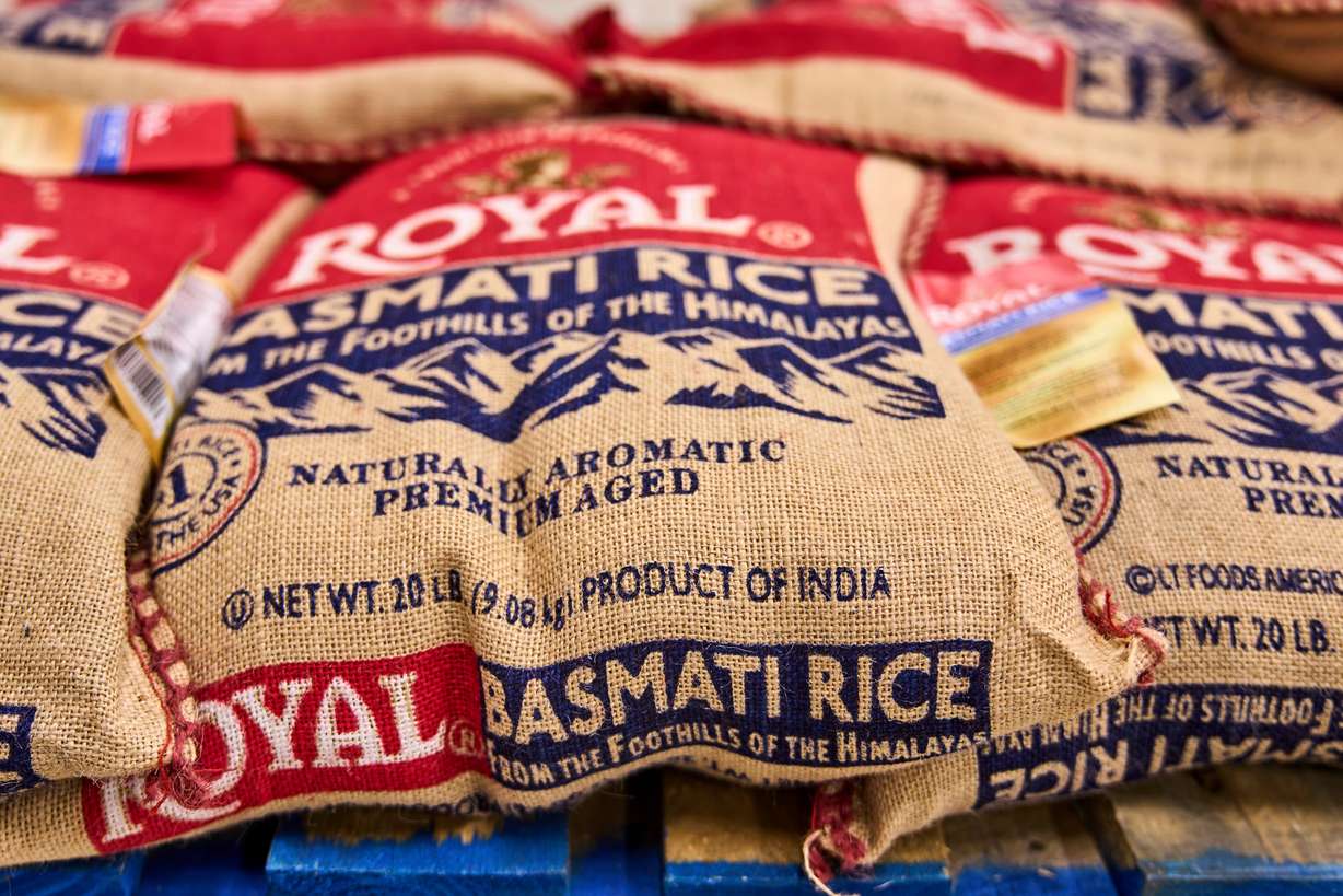 Sacks of Royal Basmati extra long rice imported from India are sold at Koseli Mart in Artesia, Calif., Aug. 7. Indian experts who spoke with Utah's trade delegation don't appear to be alarmed by the prospect of increased U.S. tariffs.