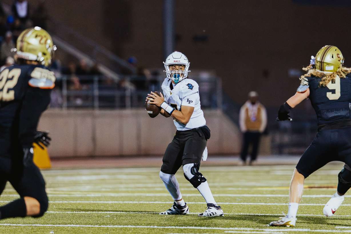 Lone Peak and Davis battle in the quarterfinals of the 6A state playoffs in Kaysville on Nov. 7, 2025.