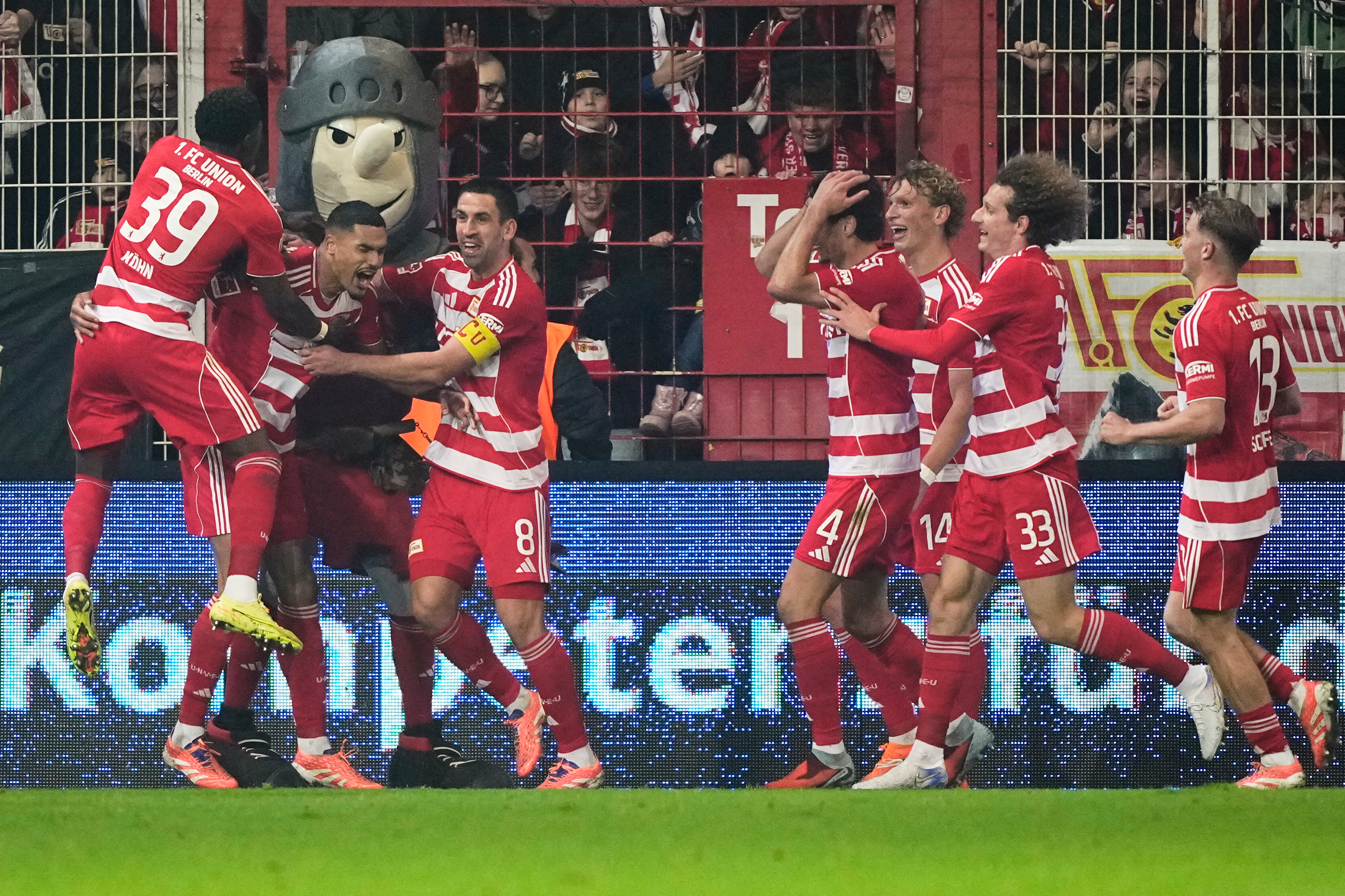 Union's Danilho Doekhi celebrates with team mates after scoring his side's second goal during the Bundesliga soccer match between Union Berlin and FC Bayern Munich in Berlin, Germany, Saturday, Nov. 8, 2025.