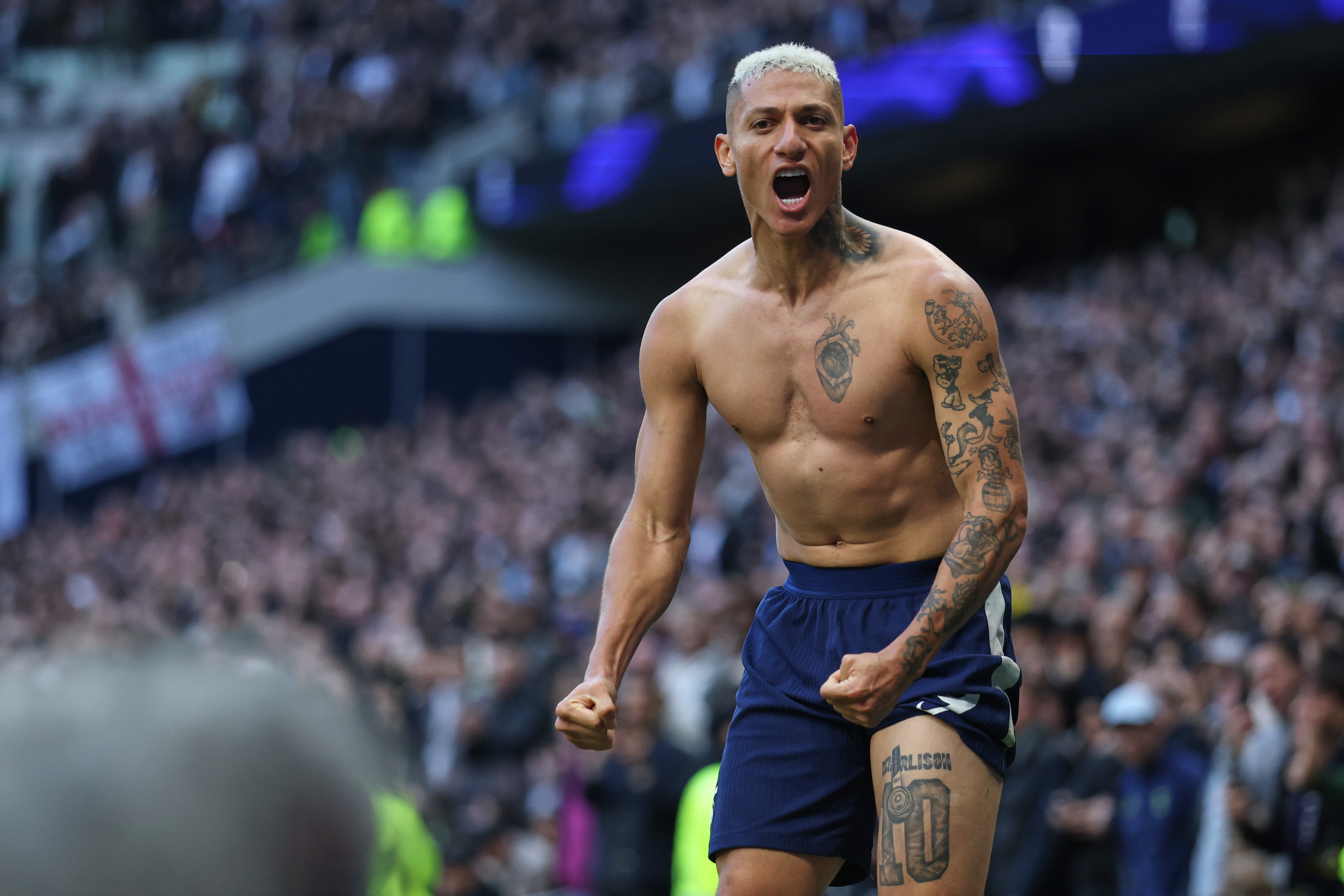 Tottenham's Richarlison celebrates after scoring his side's second goal during the English Premier League soccer match between Tottenham Hotspur and Manchester United in London, England, Saturday, Nov. 8, 2025.