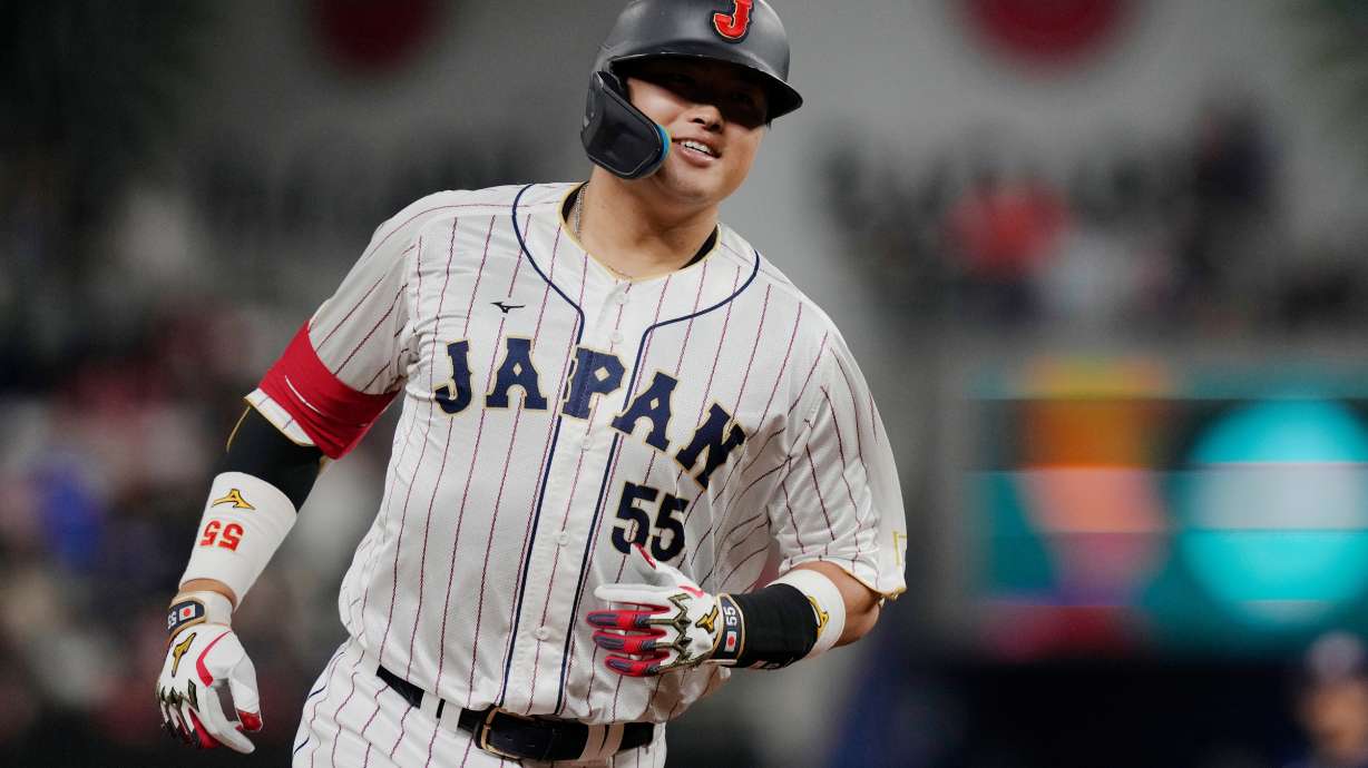 FILE - Japan third baseman Munetaka Murakami (55) runs the bases after hitting a home run during the second inning of a World Baseball Classic game against the United States, Tuesday, March 21, 2023, in Miami.