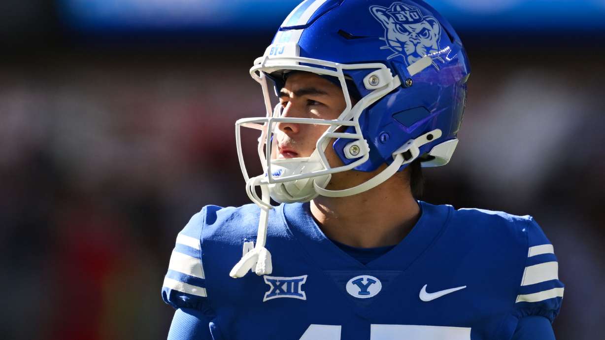 BYU Cougars quarterback Bear Bachmeier (47) looks around the stadium as he warms up prior to playing Texas Tech play at Jones AT&T Stadium in Lubbock Texas on Saturday, Nov. 8, 2025.