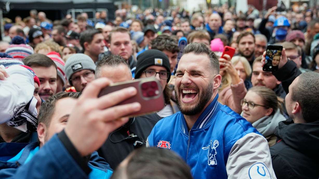 Former Indianapolis Colts player Björn Werner meets fans at Das Center in Potsdamer Platz in Berlin Germany, Saturday, Nov. 8, 2025, ahead of Sunday's NFL football game against the Atlanta Falcons.