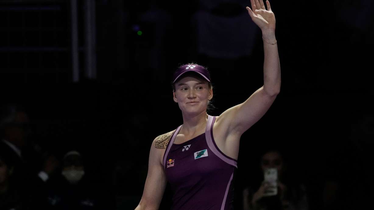 Elena Rybakina of Kazakhstan celebrates after defeating Aryna Sabalenka of Belarus in the women's final singles match of the WTA finals in Riyadh, Saudi Arabia, Saturday, Nov. 8, 2025.