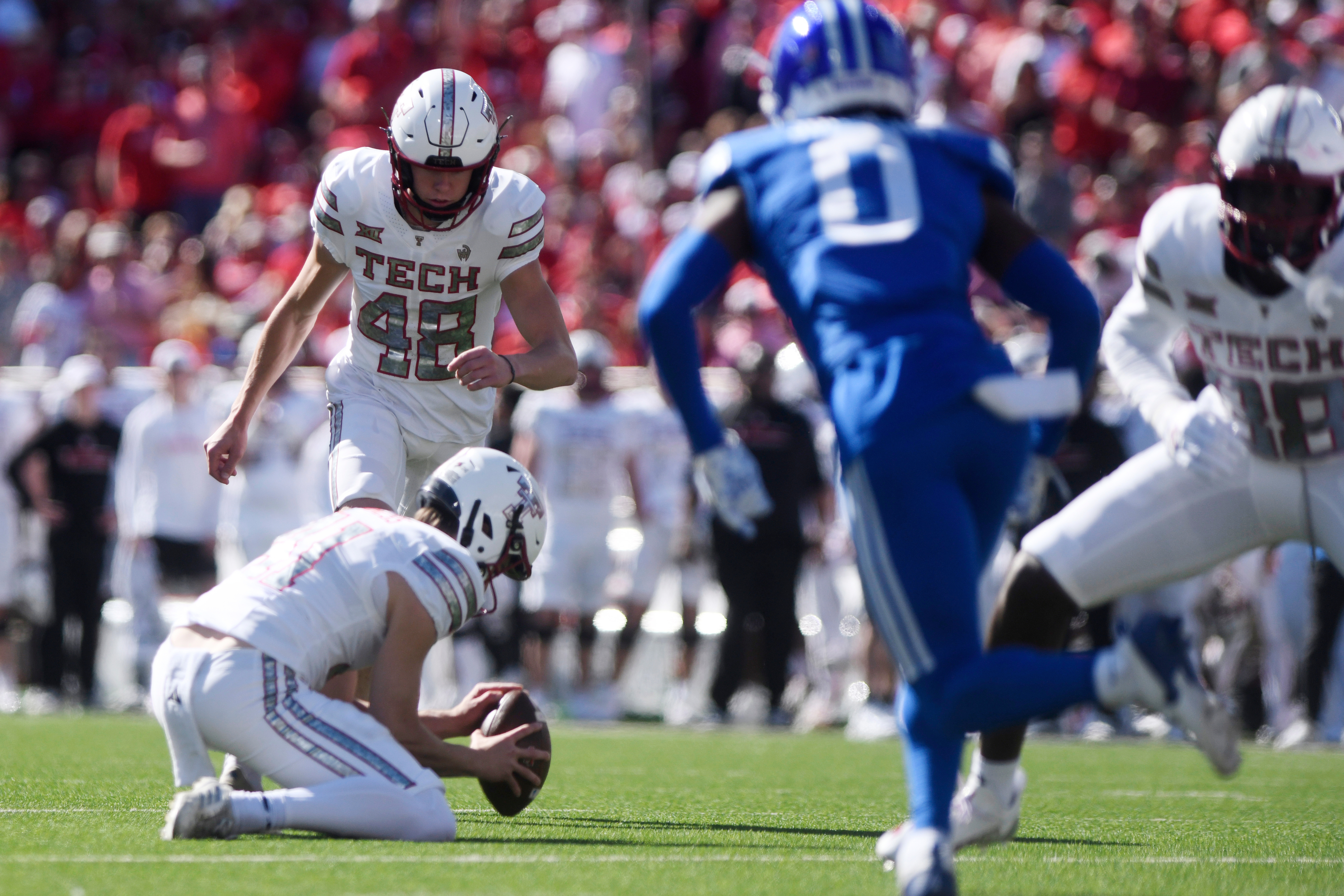 Texas Tech place kicker Stone Harrington (48) kicks a field goal during the first half of an NCAA college football game against BYU, Saturday, Nov. 8, 2025, in Lubbock, Texas. 
