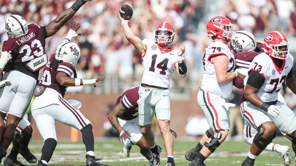 Georgia quarterback Gunner Stockton (14) throws a pass against Mississippi State during the first half of an NCAA college football game in Starkville, Miss., Saturday, Nov. 8, 2025.