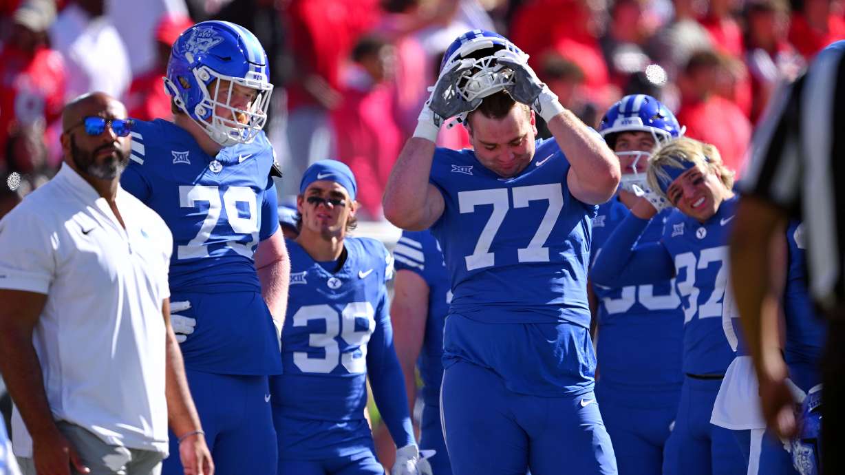 Dejected BYU players and staff watch the replay of a penalty as they and Texas Tech play at Jones AT&T Stadium in Lubbock Texas on Saturday, Nov. 8, 2025.