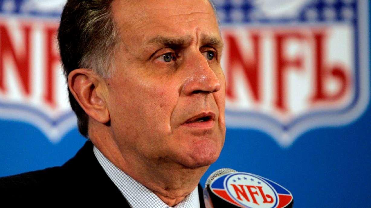 FILE - This May 23, 2006 file photo shows then NFL Commissioner Paul Tagliabue responding to questions during a news conference at the conclusion of the National Football League's owners spring meeting in Denver.