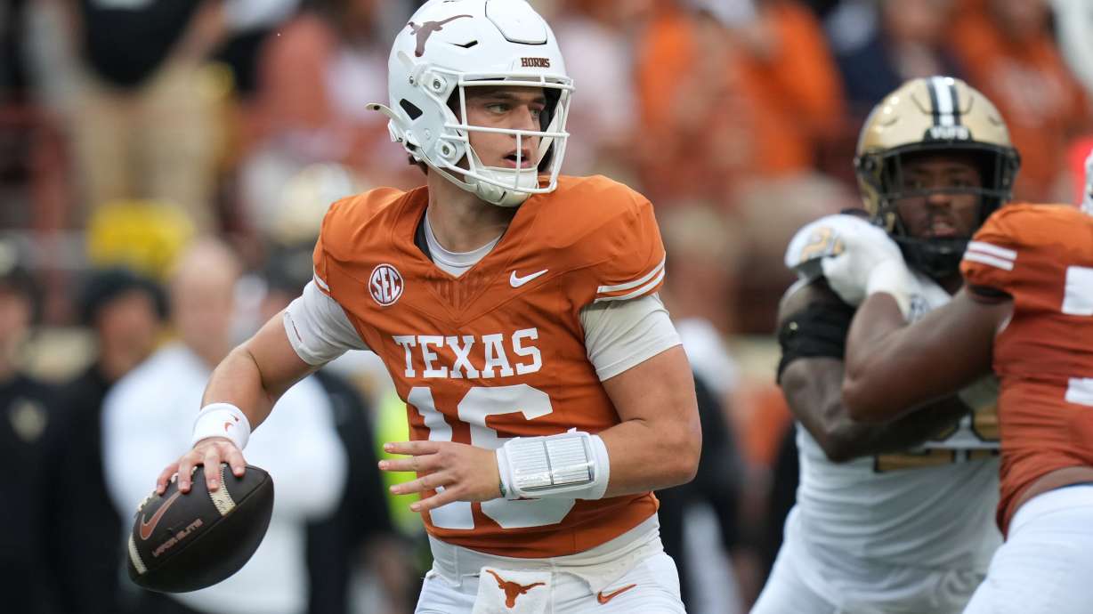 Texas quarterback Arch Manning (16) looks to throw against Vanderbilt during the second half of an NCAA college football game in Austin, Texas, Saturday, Nov. 1, 2025.