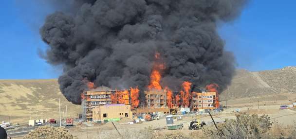 Crews contain massive fire at under-construction apartments in Lehi
