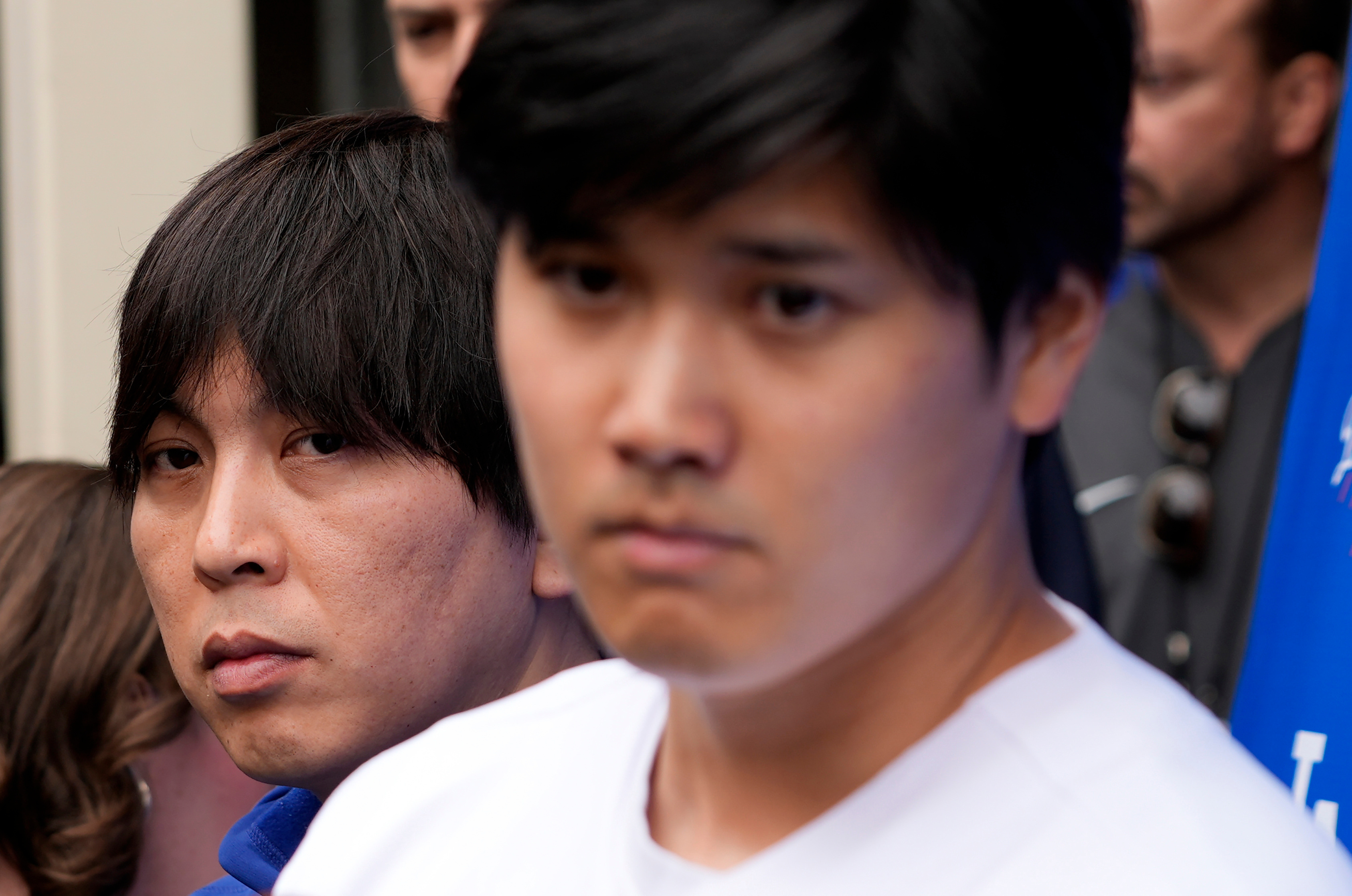 FILE - Ippei Mizuhara, left, stands next to Los Angeles Dodgers player Shohei Ohtani, right, during an interview at Dodger Stadium, Feb. 3, 2024.