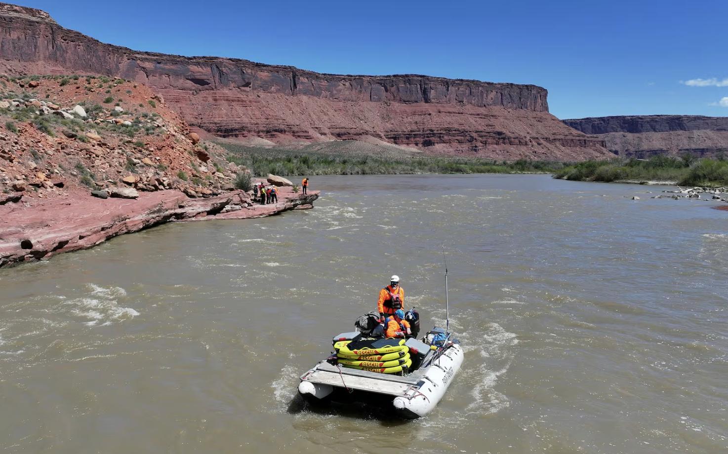 Canyonlands National Park backcountry river ranger Steve Young stands to drive a boat while teaching a Swift Water Incident Management training course on the Colorado River near Onion Creek rapids in Grand County on April 29.