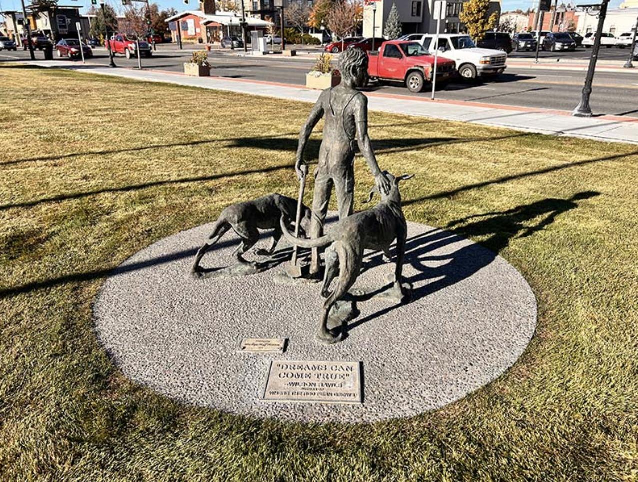 The memorial of Wilson Rawls depicts Billy Coleman and his dogs from “Where the Red Fern Grows.” Rawls wrote the book when he lived in Idaho Falls.