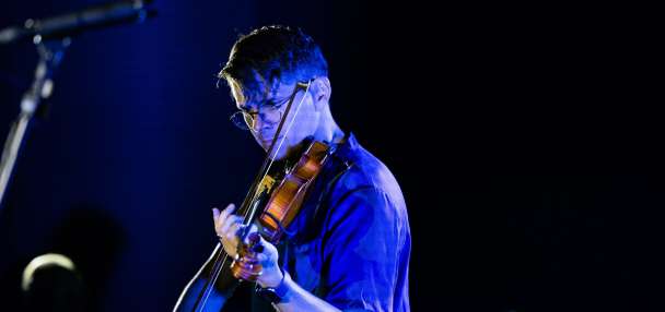 He's standing up for the coral reefs … with his violin