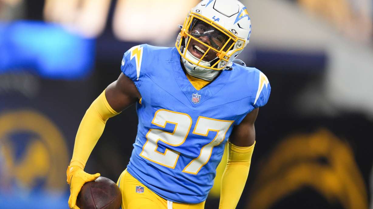 Los Angeles Chargers safety RJ Mickens (27) celebrates his interception during the first half of an NFL football game against the Pittsburgh Steelers Sunday, Nov. 9, 2025, in Inglewood, Calif.