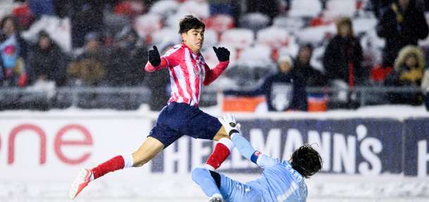 After plows clear field for overtime, Ottawa beats Calgary 2-1 in snowy North Star Cup