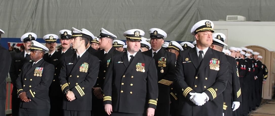 Members of the crew for the USS Utah stand at the christening ceremony for the new Virginia class submarine on Oct. 25, at the General Dynamics Electric Boat Shipyard in Groton, Conn.