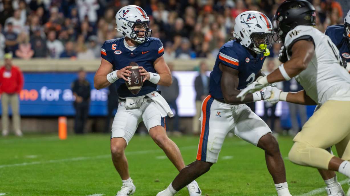 Virginia quarterback Chandler Morris (4) steps to pass against Wake Forest during the first half of an NCAA college football game, Saturday, Oct. 4, 2025, in Charlottesville, Va.