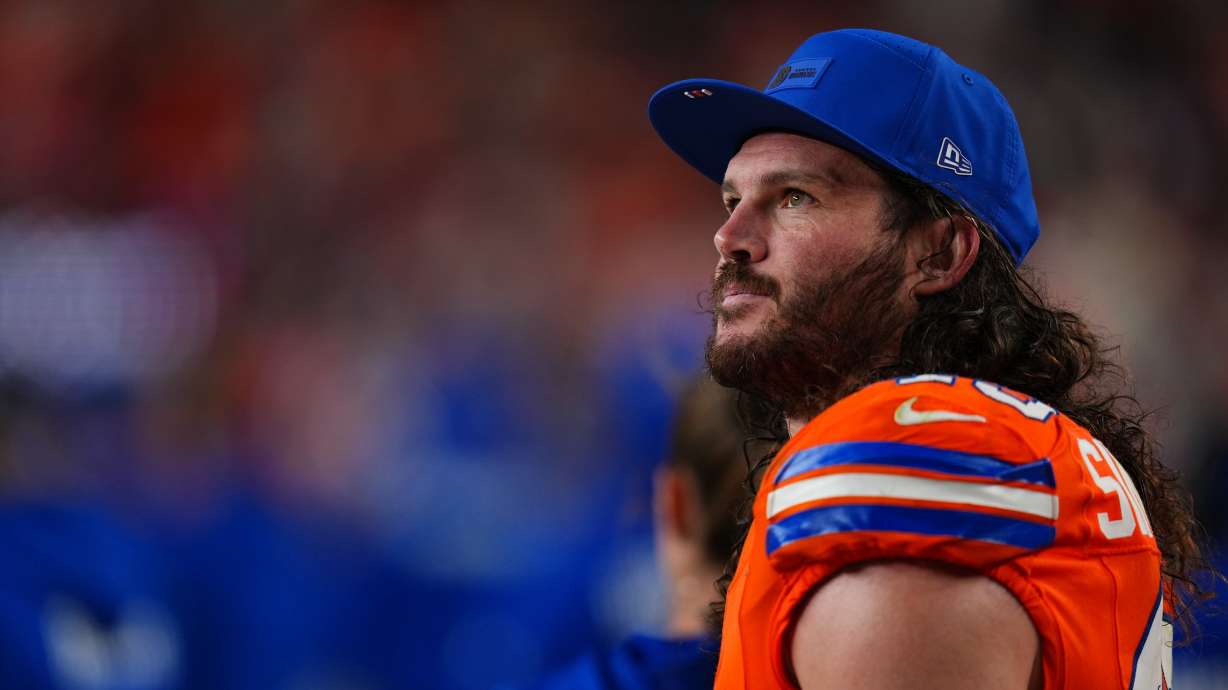 FILE - Denver Broncos inside linebacker Alex Singleton watches from the sidelines during the second half of an NFL football game against the Las Vegas Raiders Thursday, Nov. 6, 2025, in Denver.