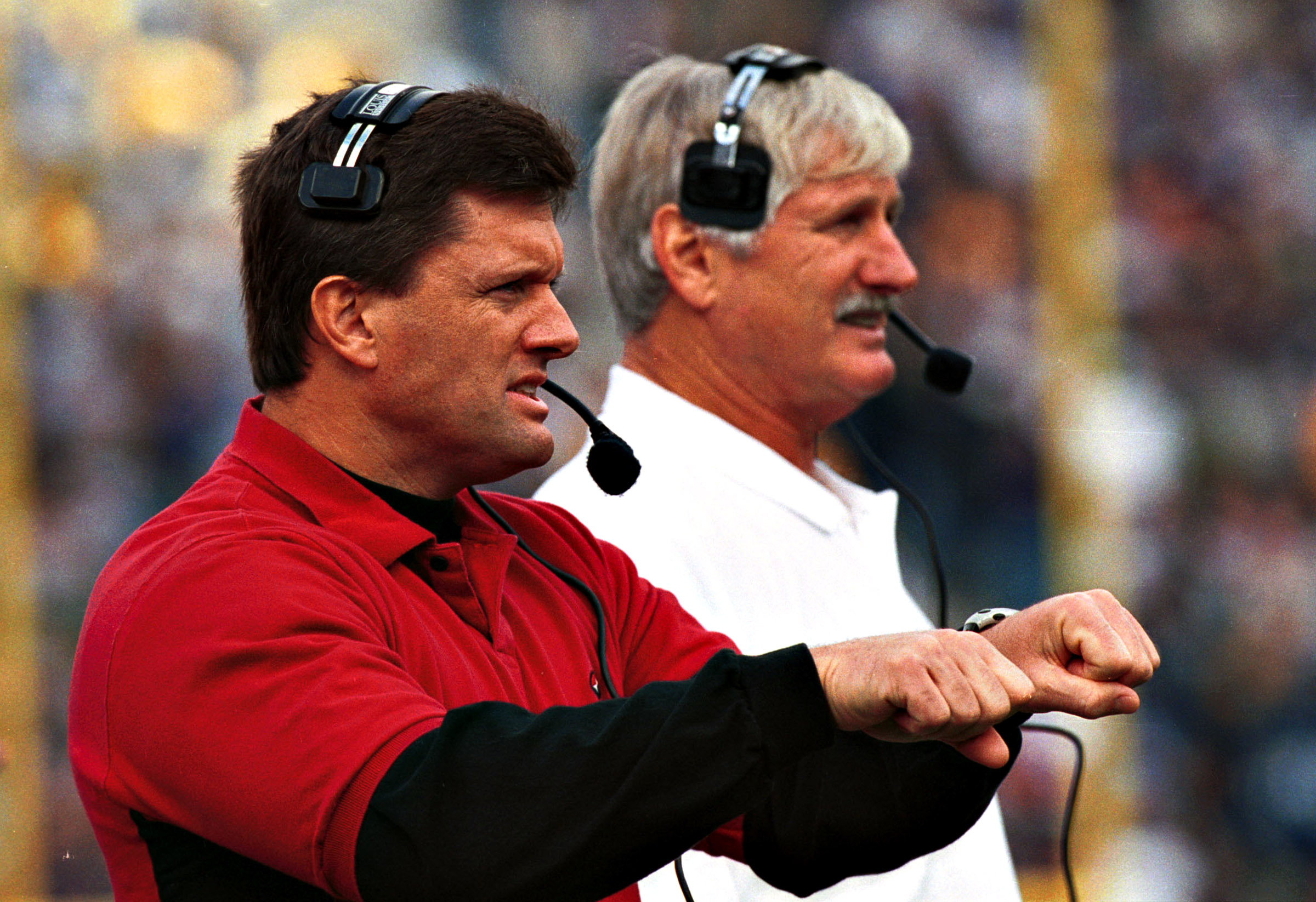After coaching for two years at Idaho State University, Kyle Whittingham, left, came to the University of Utah to coach under his father, Fred Whittingham, right. Fred Whittingham coached in the NFL in the '80s and '90s as well.