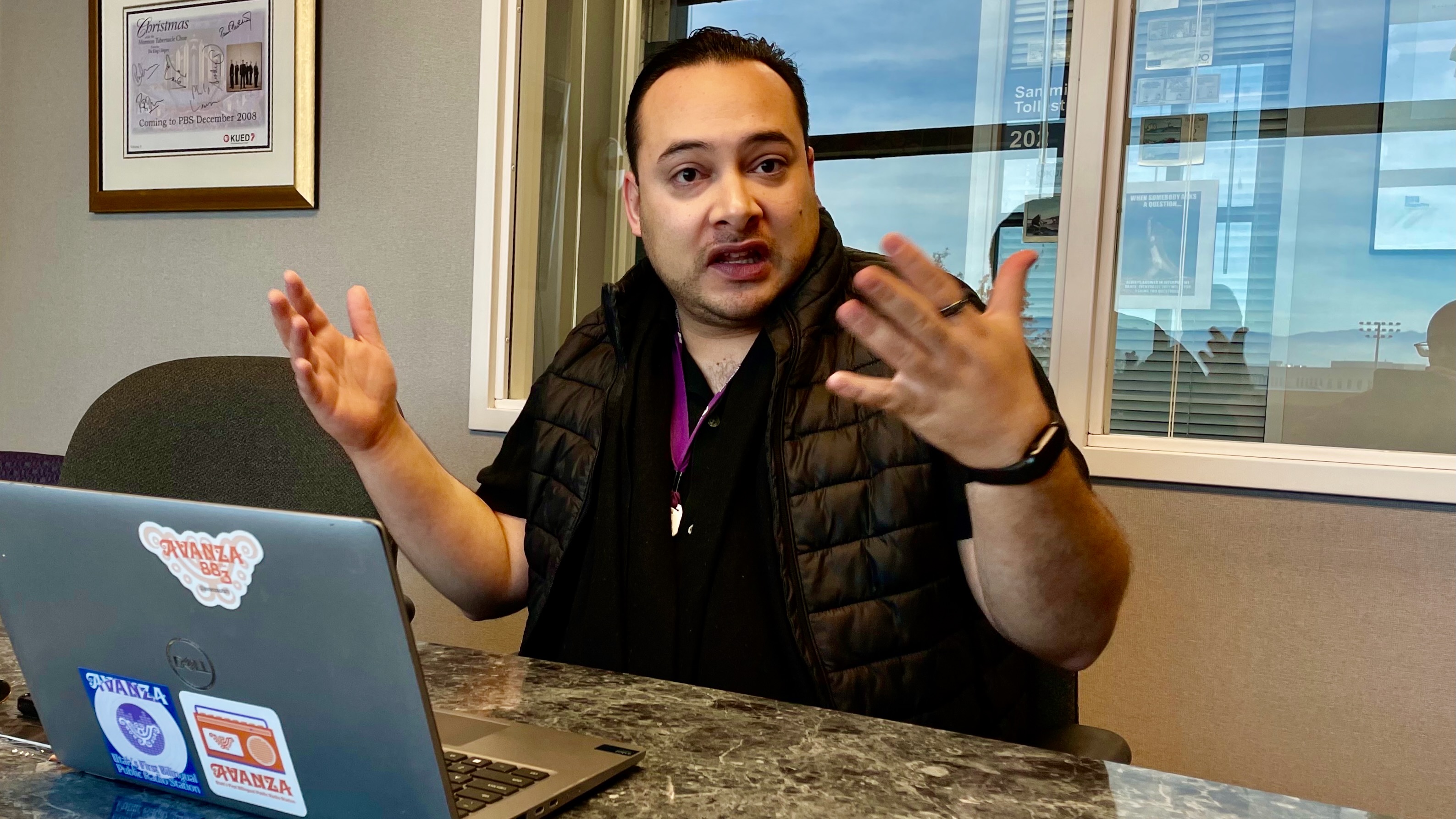 Edgar Zuñiga, program director for Avanza, discusses the Salt Lake City-based radio station at its offices on the University of Utah campus on Monday. It offers programming in English, Spanish and Spanglish.