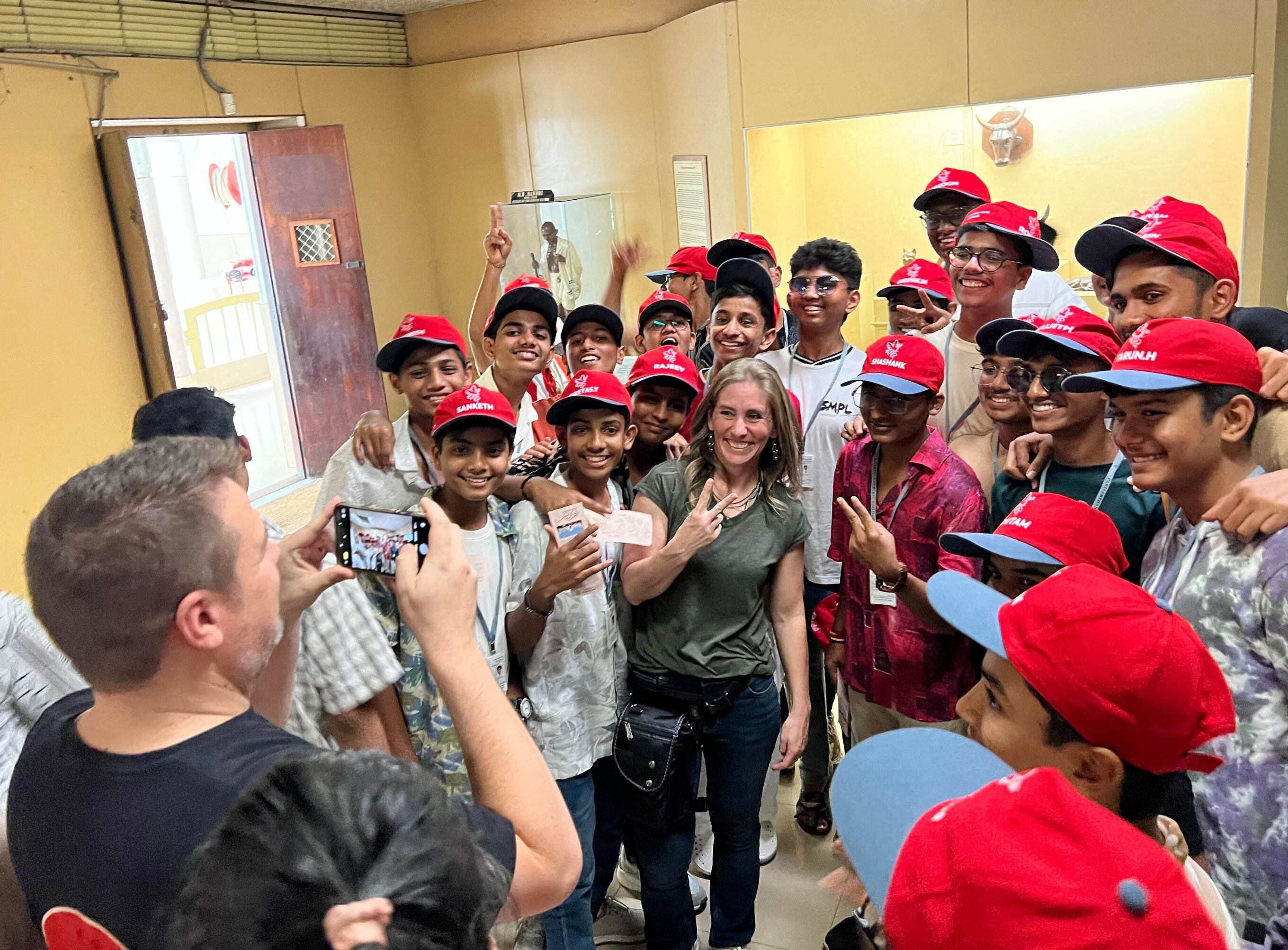 Utah Rep. Matt MacPherson, R-West Valley City, takes a photo of his wife, Nicole, who is posing with high schoolers on a field trip at the Salar Jung Museum in Hyderabad, Telangana, India.