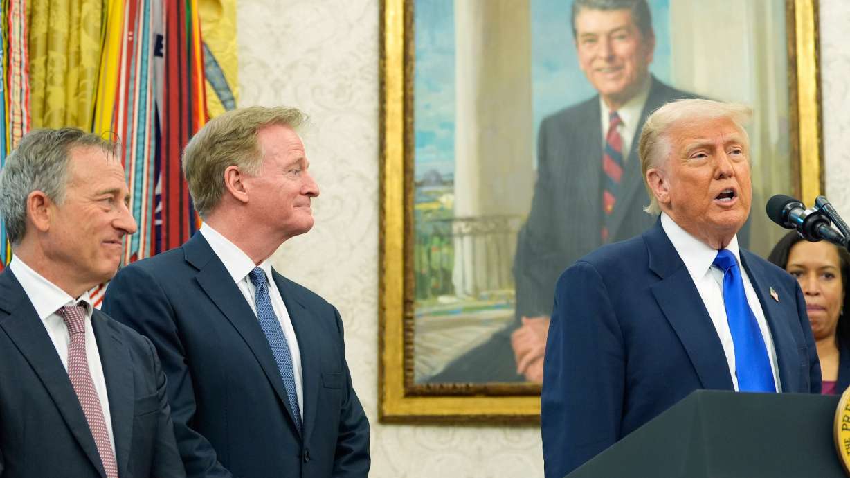 FILE - President Donald Trump speaks as Washington Commanders owner Josh Harris, from left, NFL Commissioner Roger Goodell and District of Columbia Mayor Muriel Bowser listen during an event in the Oval Office of the White House, May 5, 2025, in Washington.