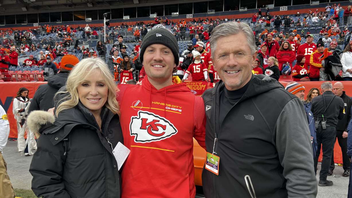 Alex Whittingham of the Kansas City Chiefs poses with his parents Kyle and Jamie Whittingham in Kansas City.