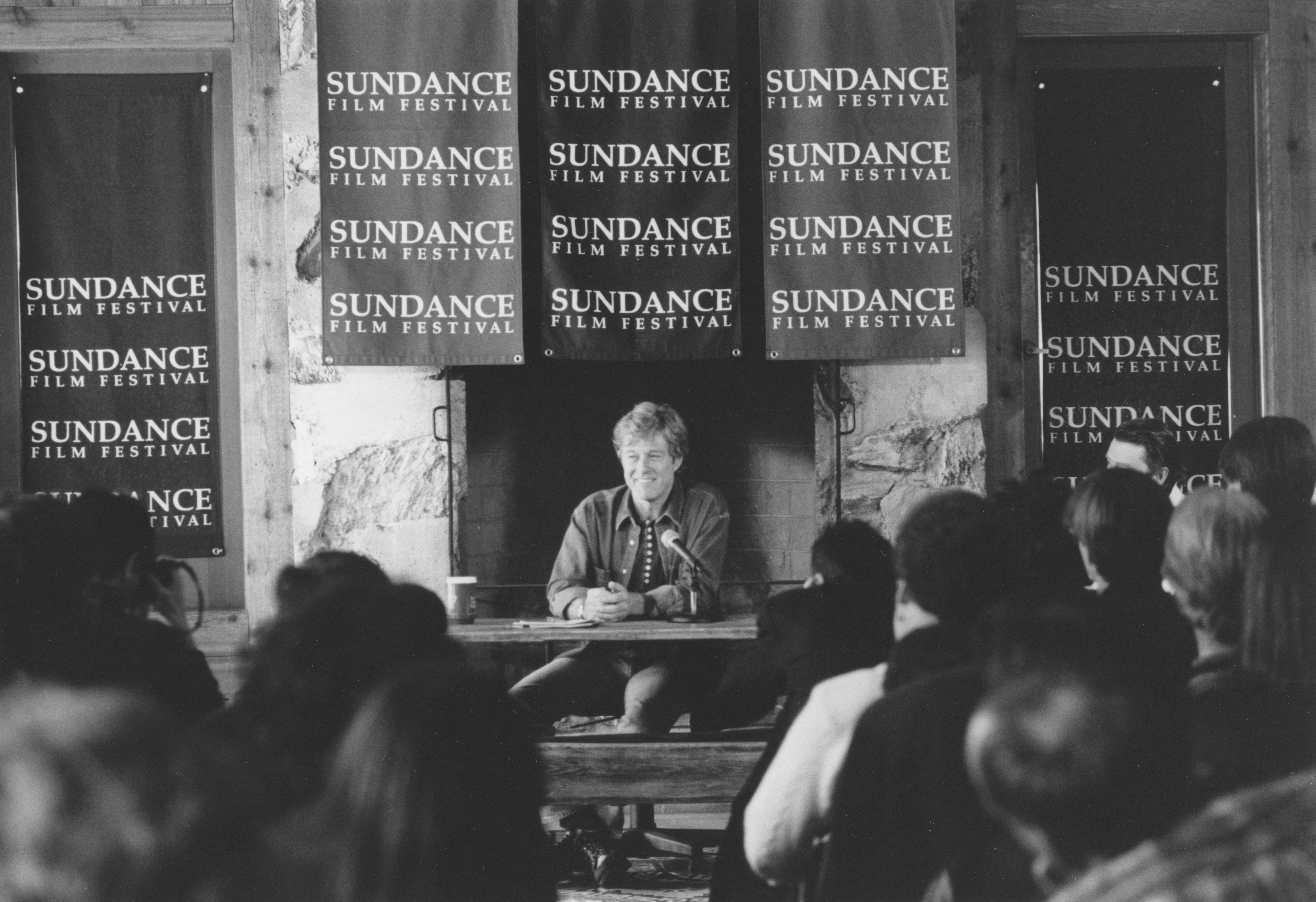 Robert Redford speaks at a press conference in 1996. The Sundance Institute announced Wednesday it will host a special evening honoring the late founder who impacted hundreds of filmmakers in his time.