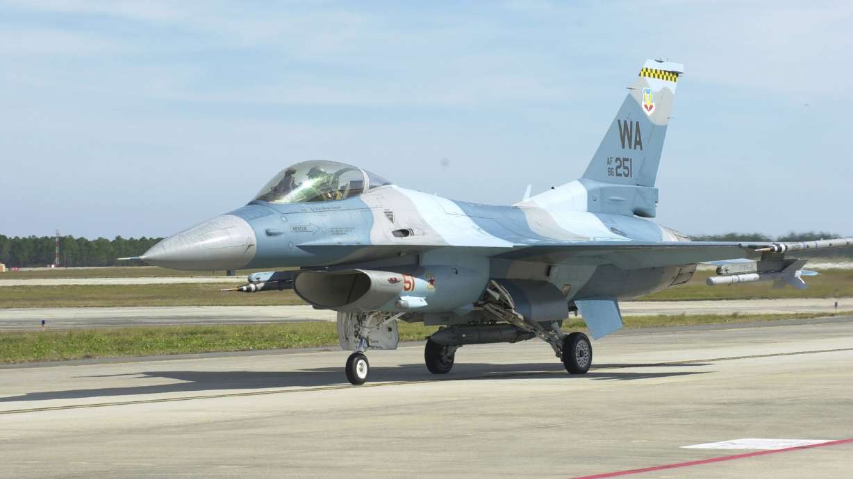 An F-16 Fighting Falcon returns from a mission at Tyndall Air Force Base, Fla., on Nov. 16, 2004. Outdoor Christmas decorations are not allowed to be out before Thanksgiving, the base's housing landlord said on Wednesday.